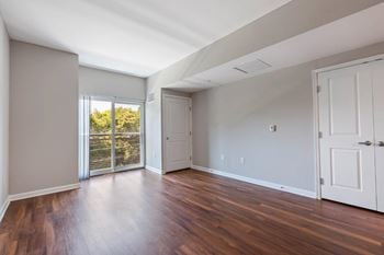 Nobe market apartments in north bethesda, maryland living room with wood plank flooring
